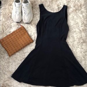 Navy blue fit and flare skater dress with low back
